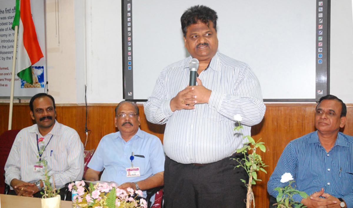 ASN College PG Centre Director, Kolasani Ramchand, speaking at a seminar on &lsquo;Android Application Development&rsquo;, at PB Siddhartha College of Arts and Science, in Vijayawada, on Friday. (Photo N Kishore) 
